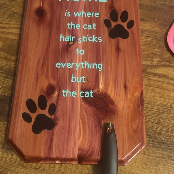 Wooden Cat-Themed Wall Art with Black Paw Prints comes with a lint roller - Picture 3 of 3